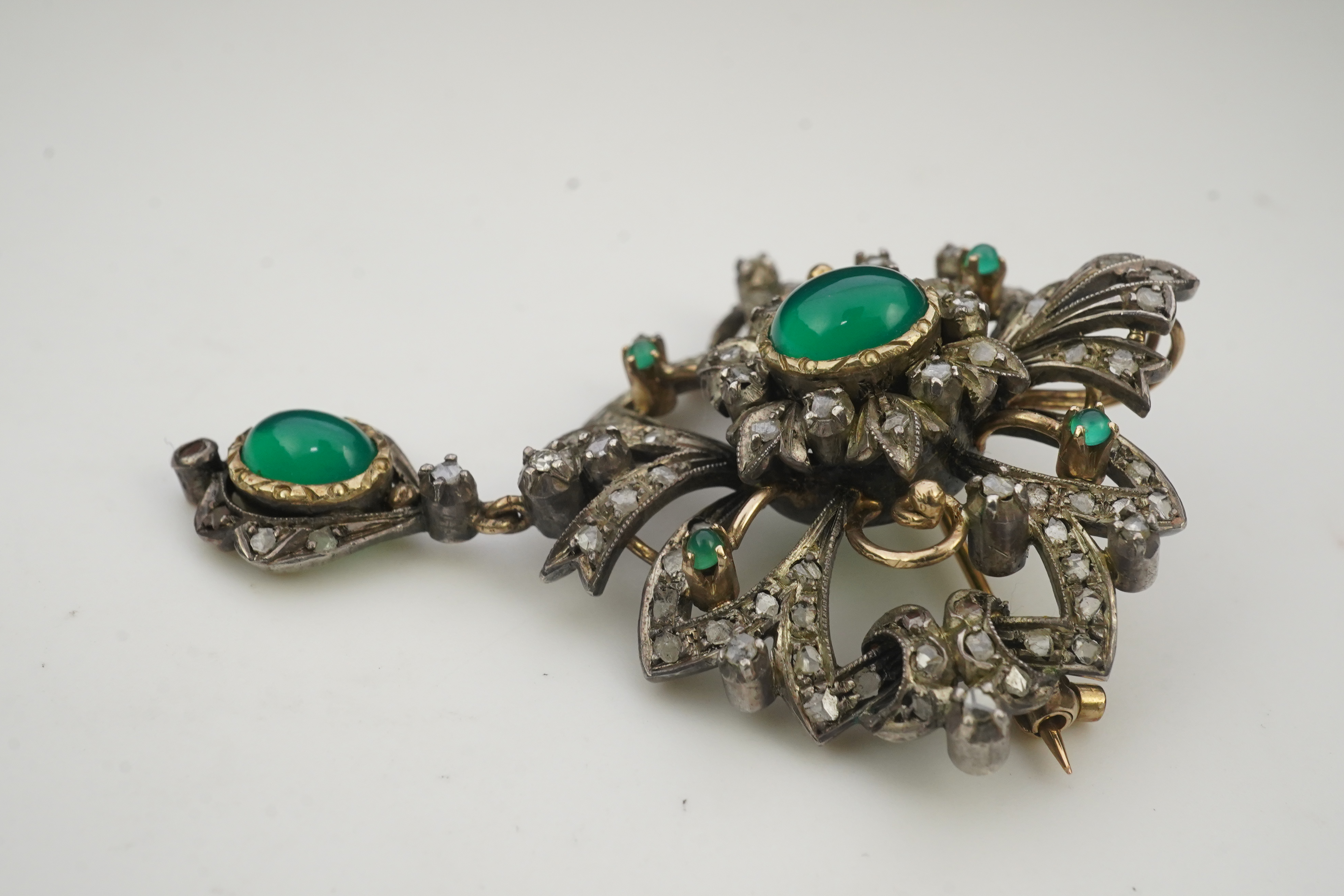 A green chalcedony and diamond brooch, mid 20th century